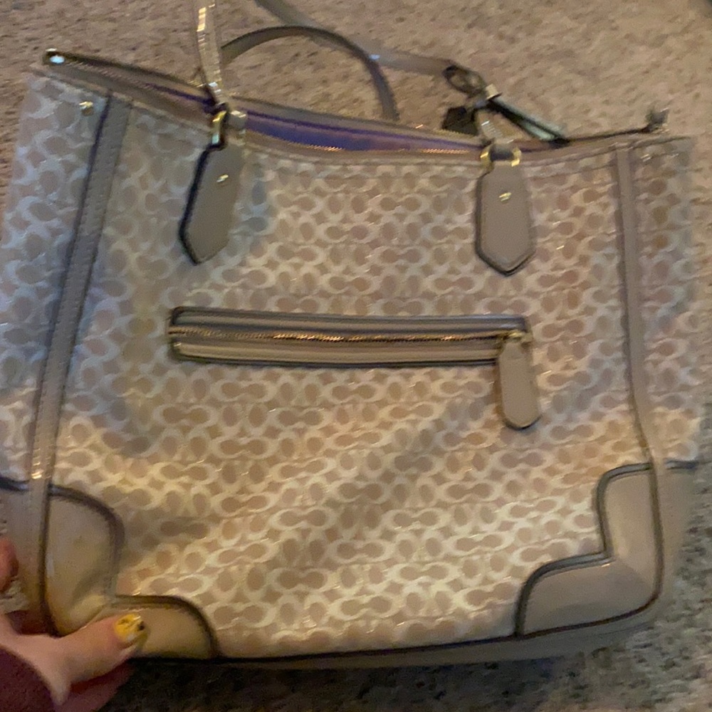 Coach gold and crime/tan tote. In great condition.